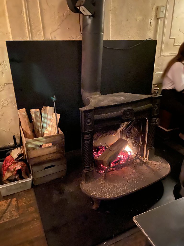 The wood burning stove at Achille Heel in Greenpoint